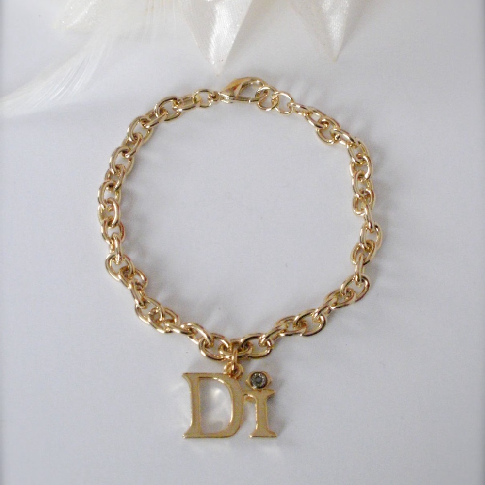 Diamond international Gold Chain Bracelet with Charm